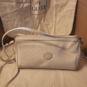 Vintage Gucci Cross body white purse. Made with white leather canvas